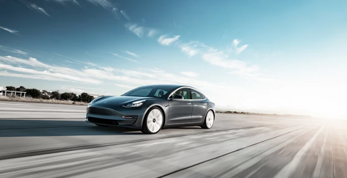 model 3 performance midnight silver tarmac motion.700x360.q90 2